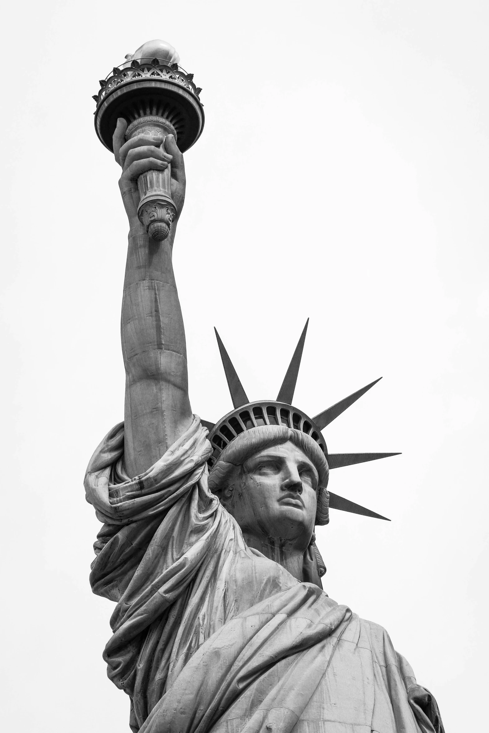 the statue of liberty is silhouetted against the sky