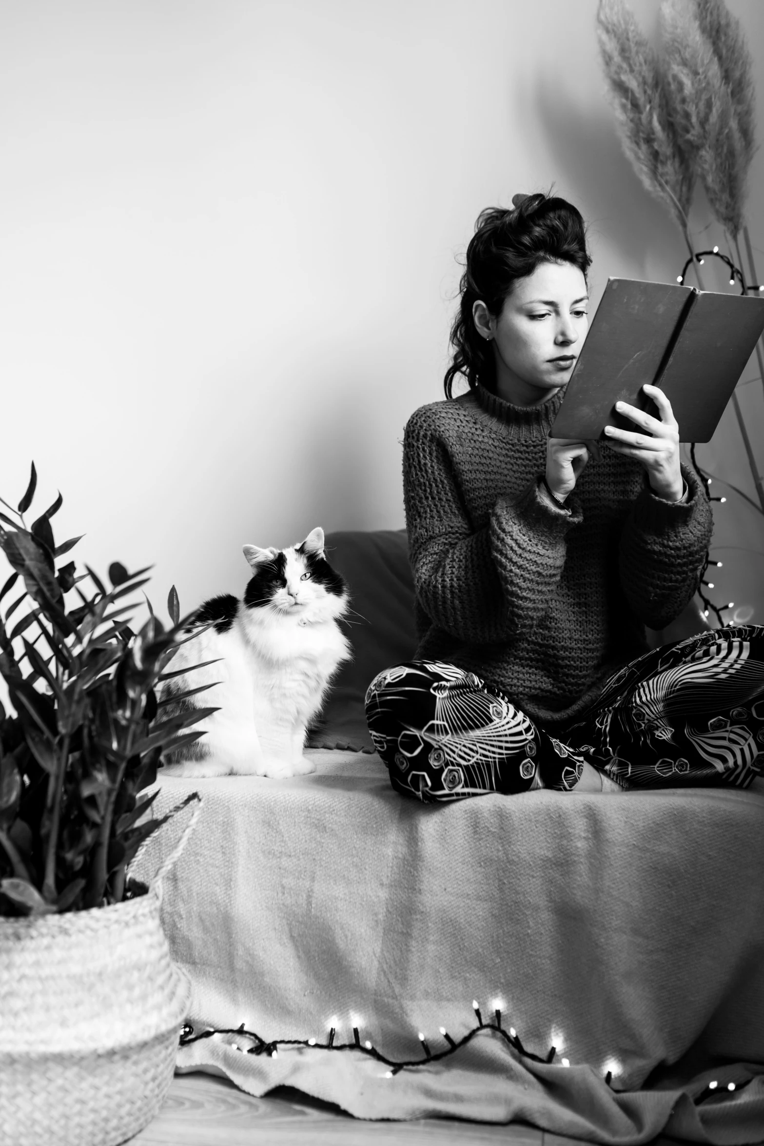 a woman on the floor using a tablet