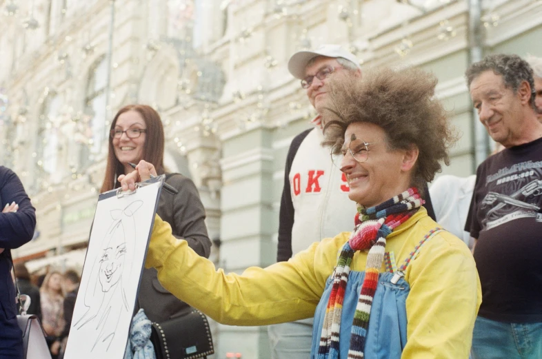 a group of people stand on the street smiling