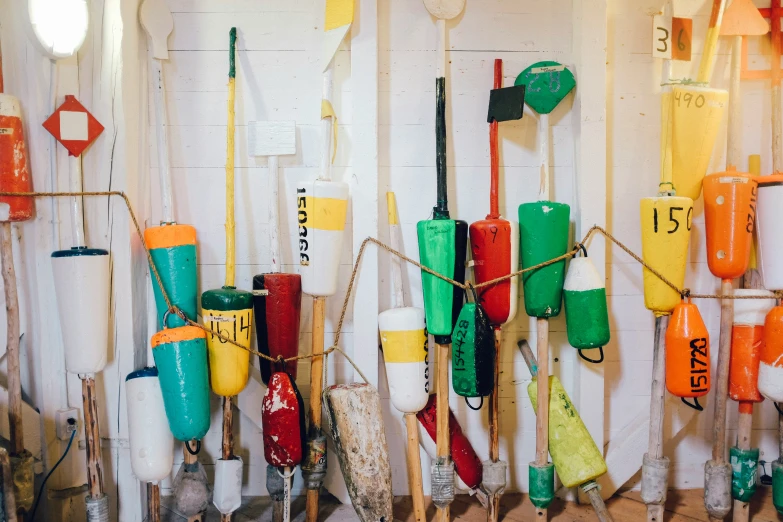 different colored objects hanging on a wall in the store