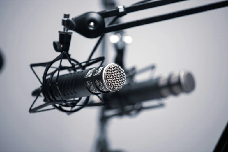 a microphone sitting in front of a set of microphones