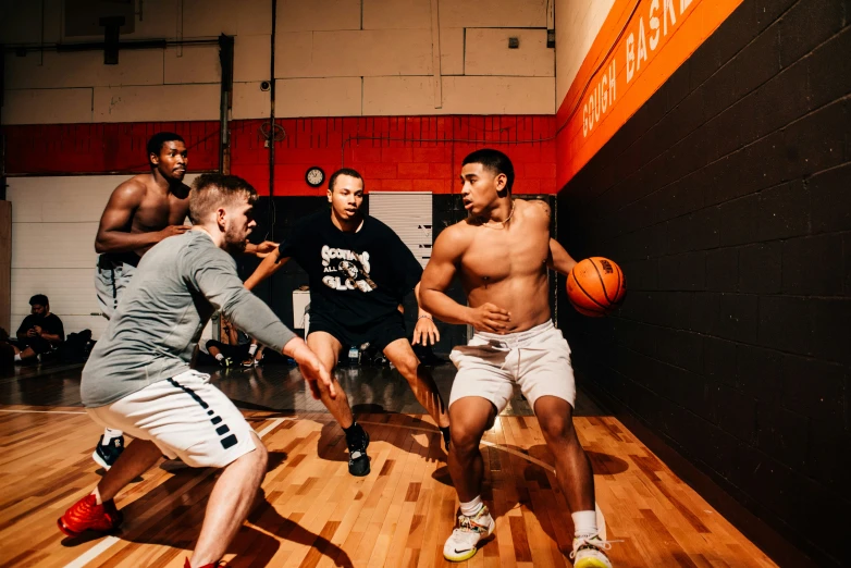 a basketball team is in action on the court