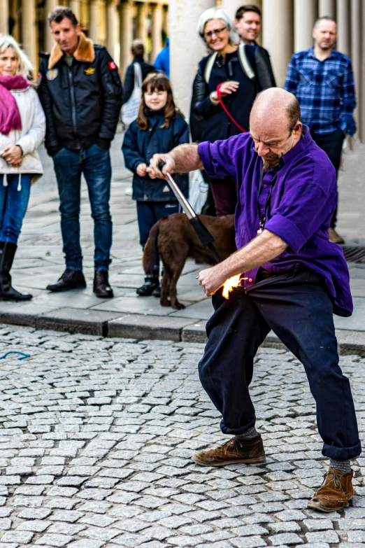 a man with a light saber in his hand as if he were trying to grab soing out