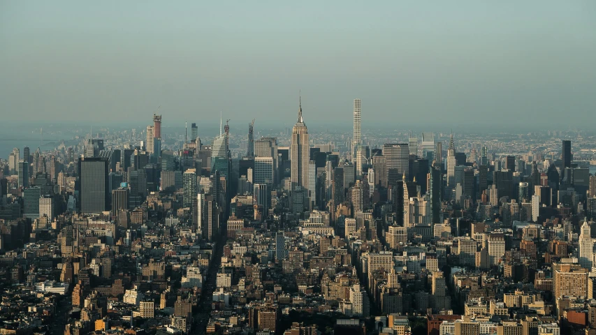 a city view is shown with lots of tall buildings