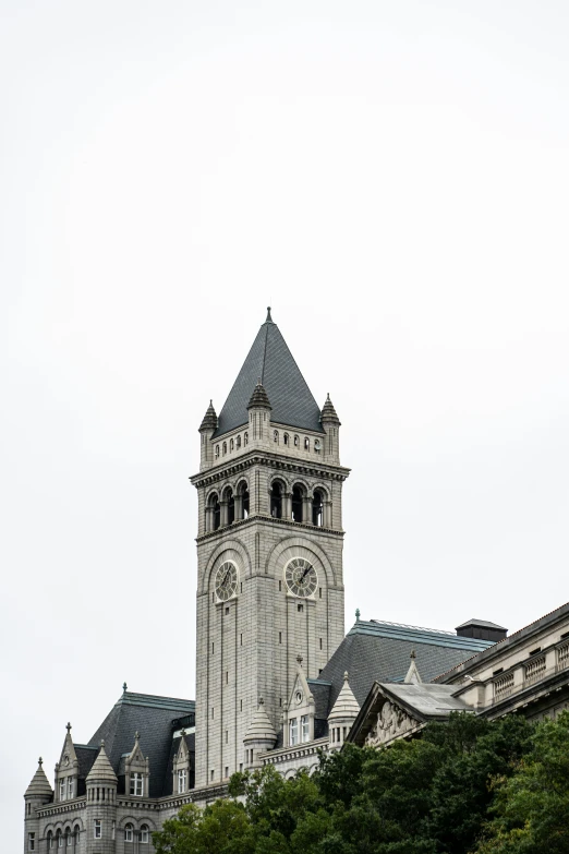 a large tall clock tower with clocks on it