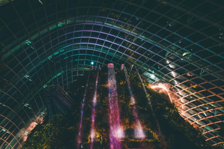 an overhead view of buildings with bright lights