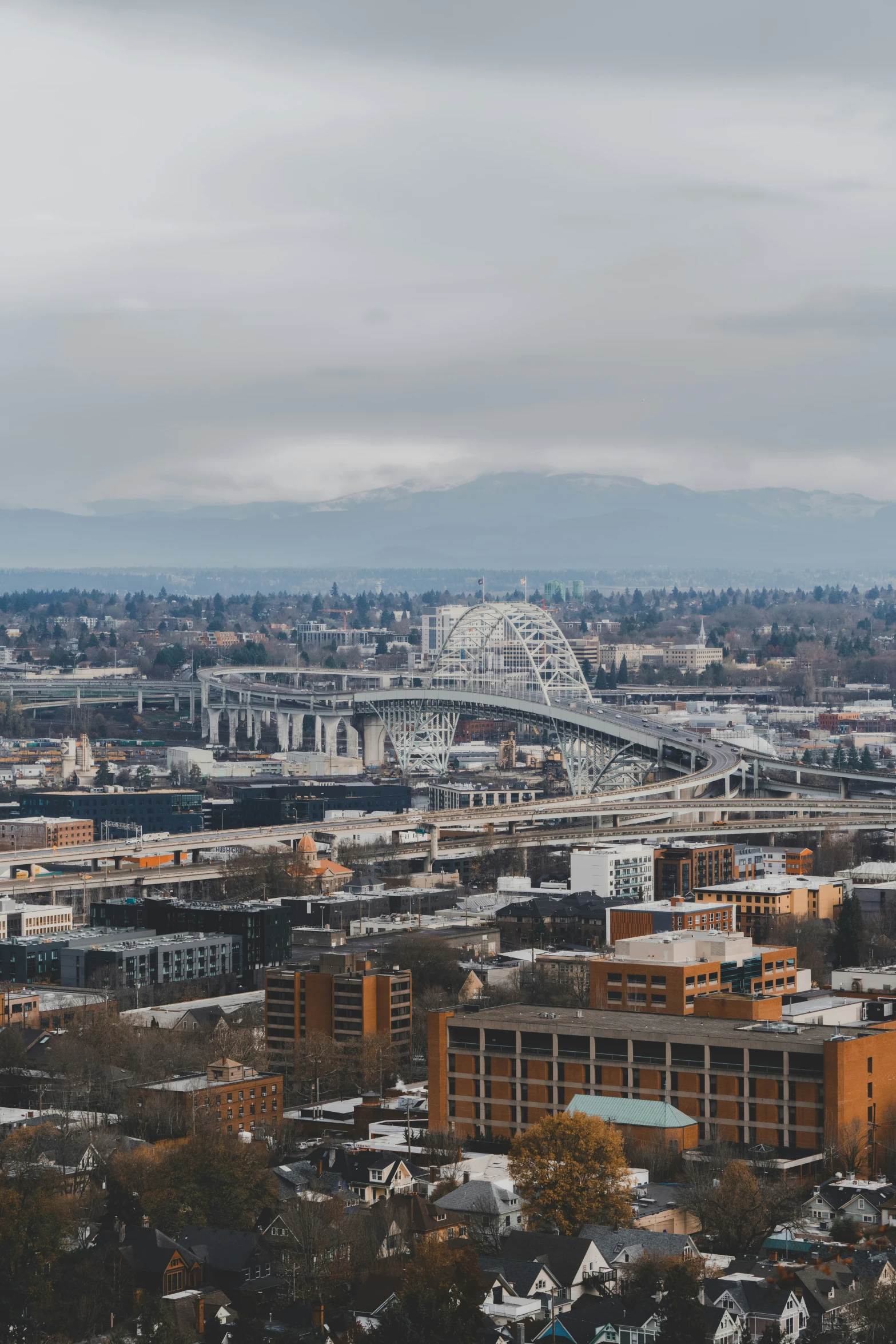 a view of a city from a hill above