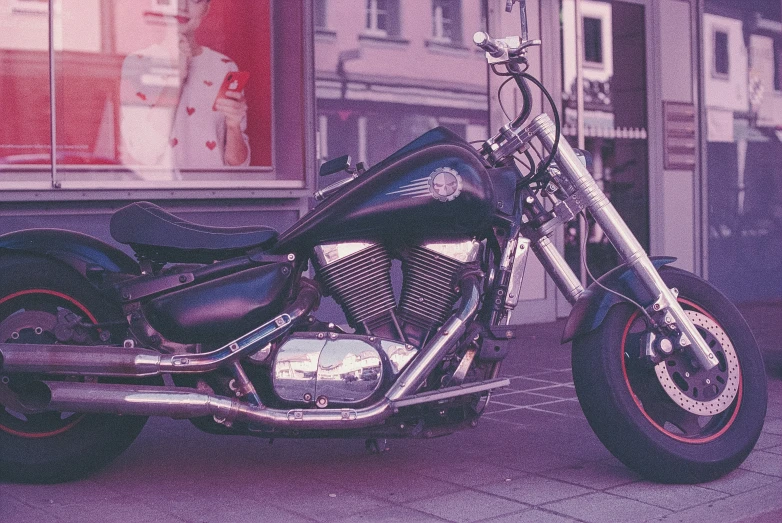 a motorcycle parked in front of a store