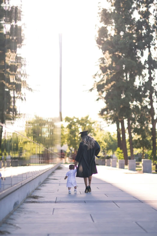 a man in a suit is walking with a child