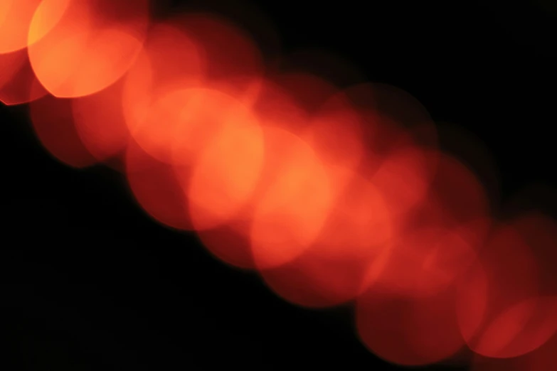 blurry image of an orange glow on the surface