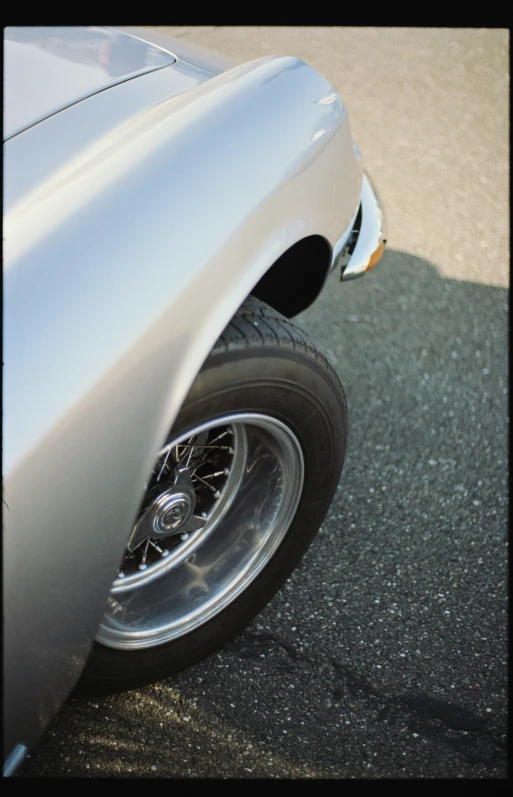 a closeup of the wheel and tire rim of an automobile