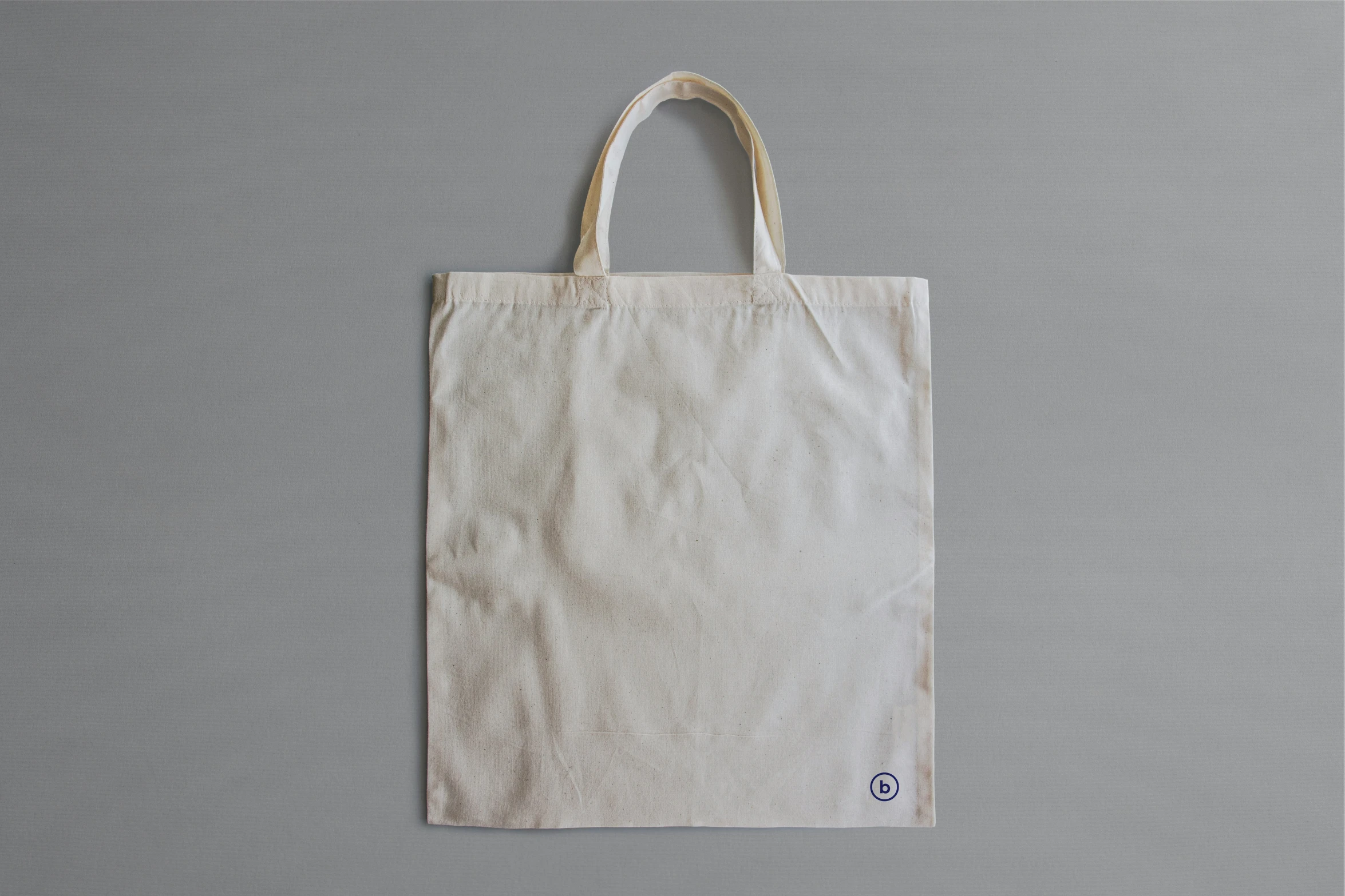 the natural canvas bag is on display