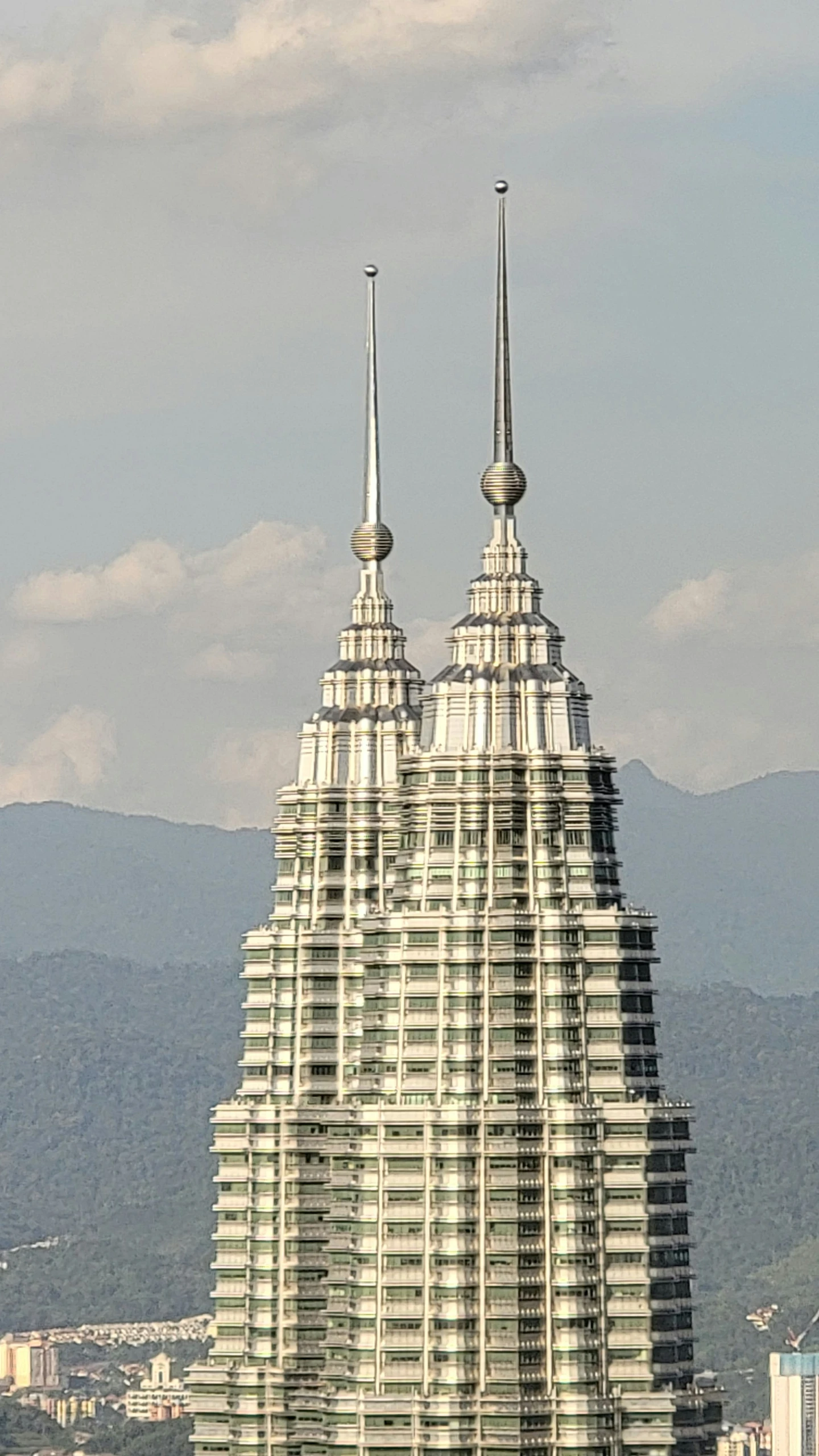 two spires on top of a tall building