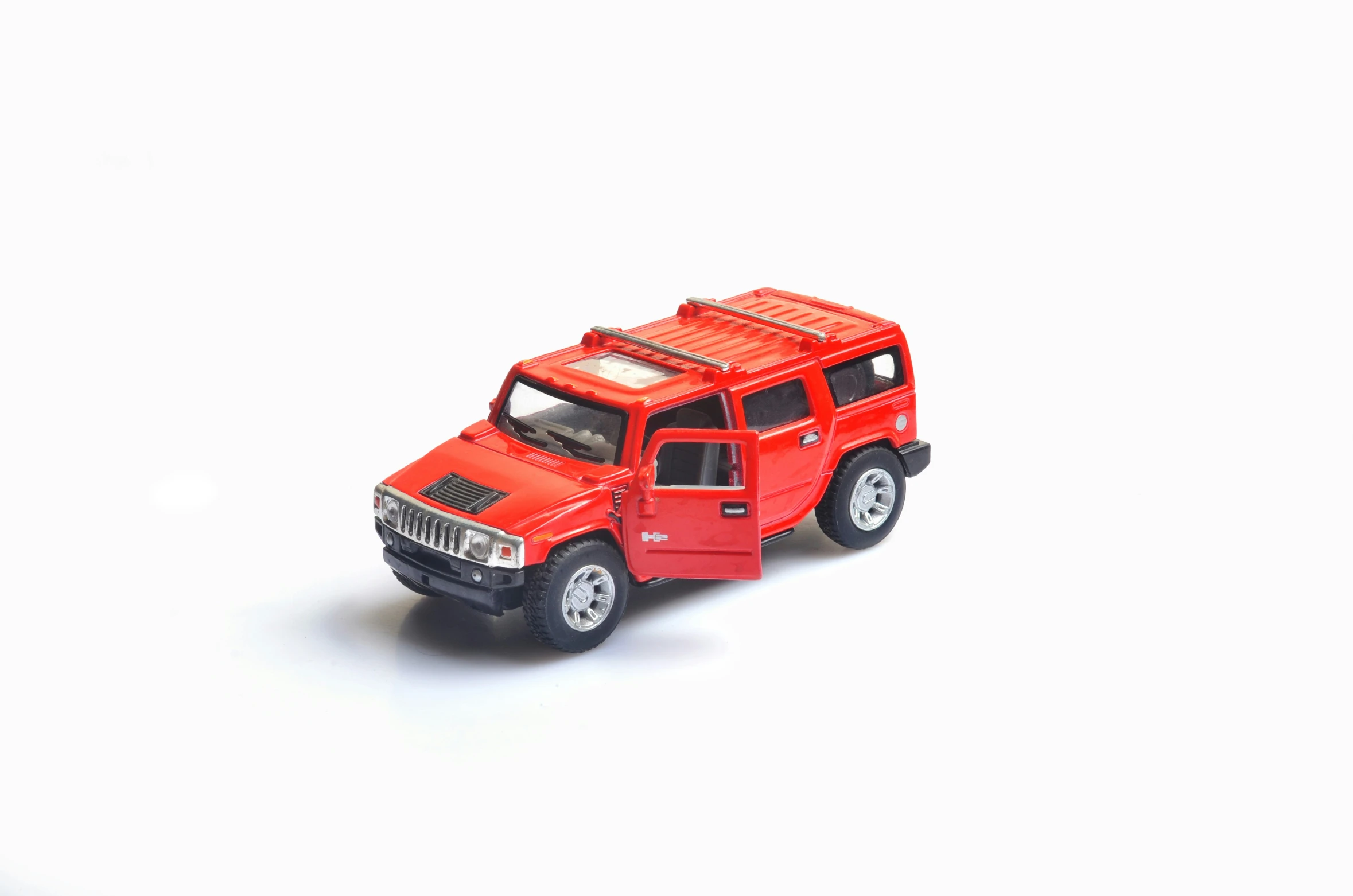 a toy suv with a roof rack is shown