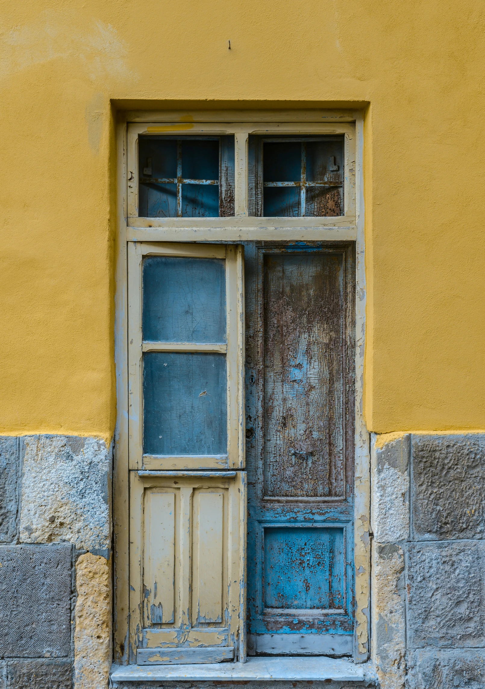 a building has broken glass on its door