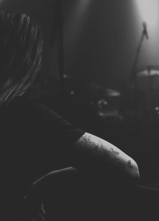 the musician is playing drums on stage