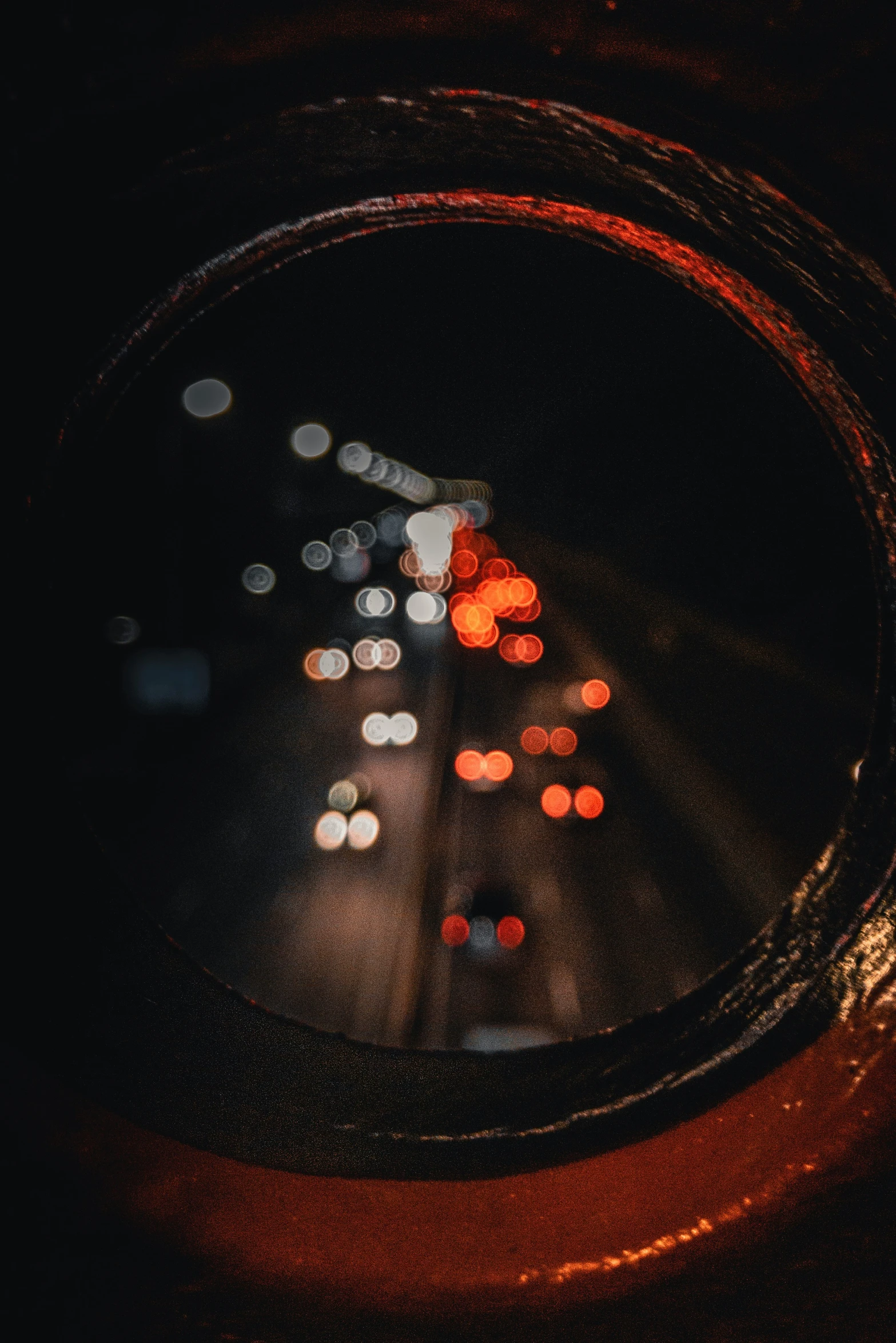 a view down at night in a traffic light