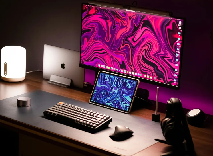 the monitor is displaying an image of purple swirled pattern