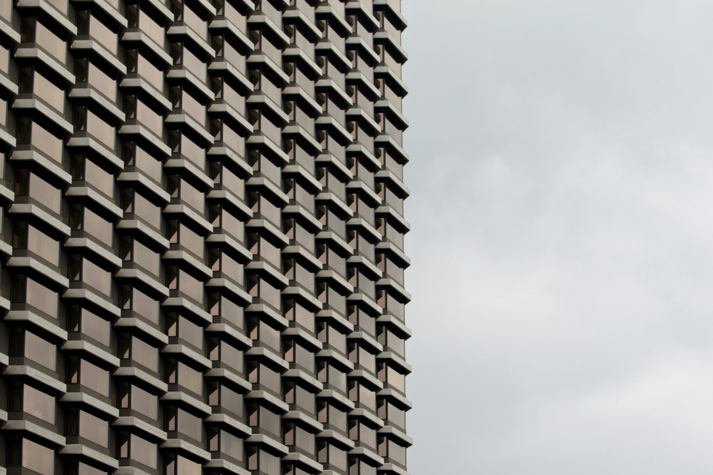 an upward view of a very tall building