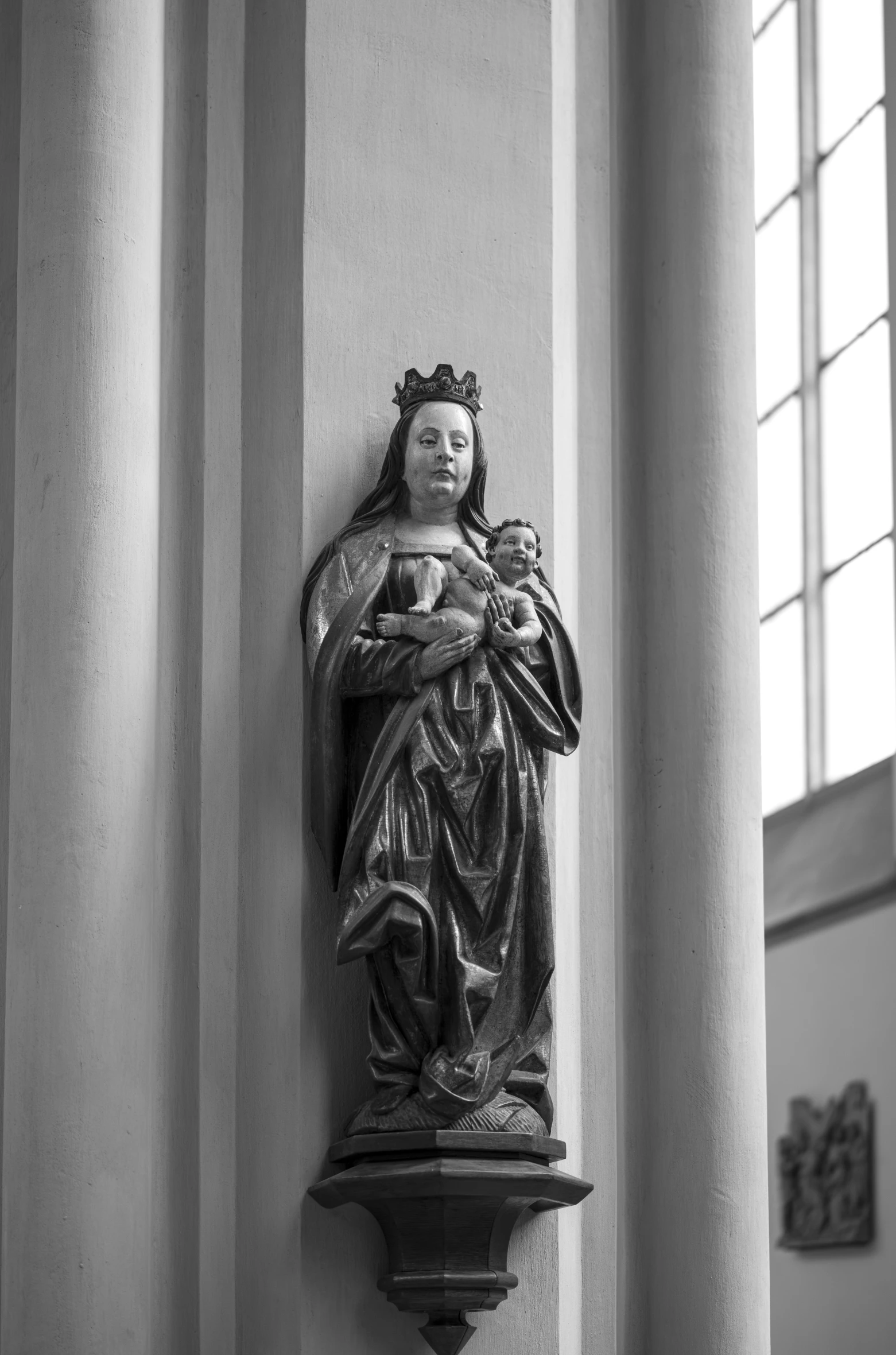 this is an image of a statue of mary in a church