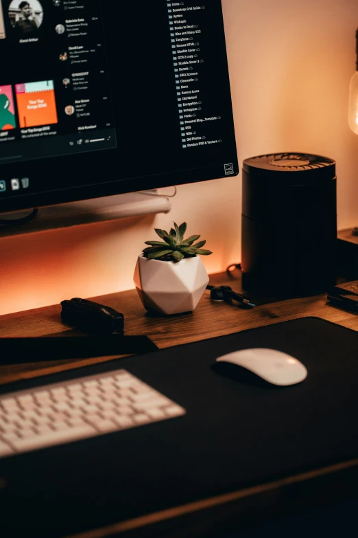 a desktop computer with a monitor on top and keyboard next to it