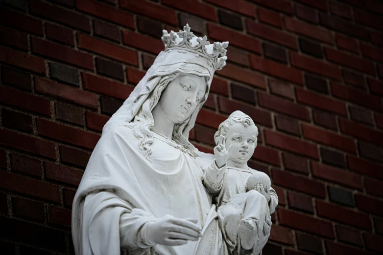 a statue of a woman with a child