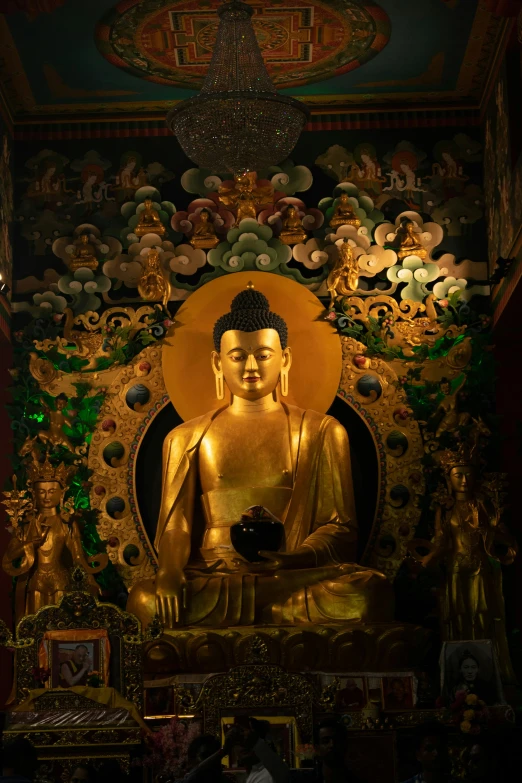 the buddha statue is displayed next to other items