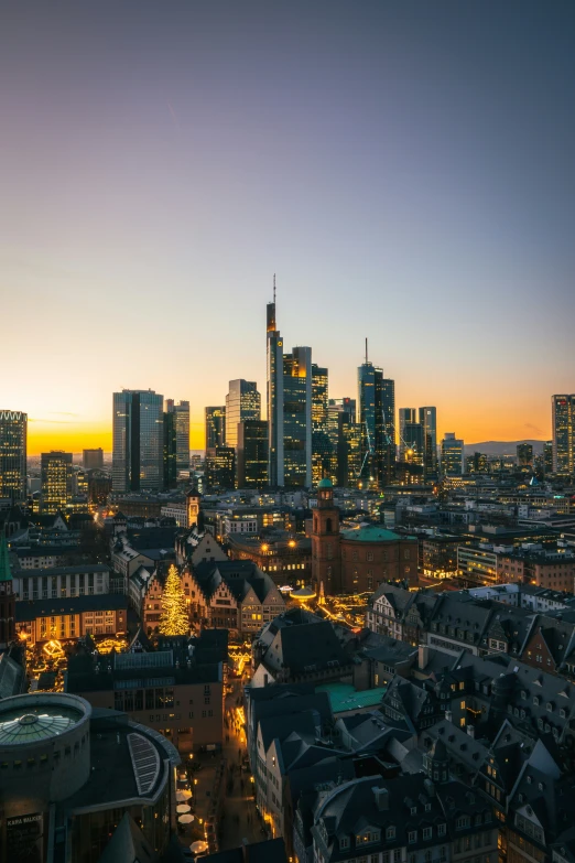 a view of buildings with a city in the background