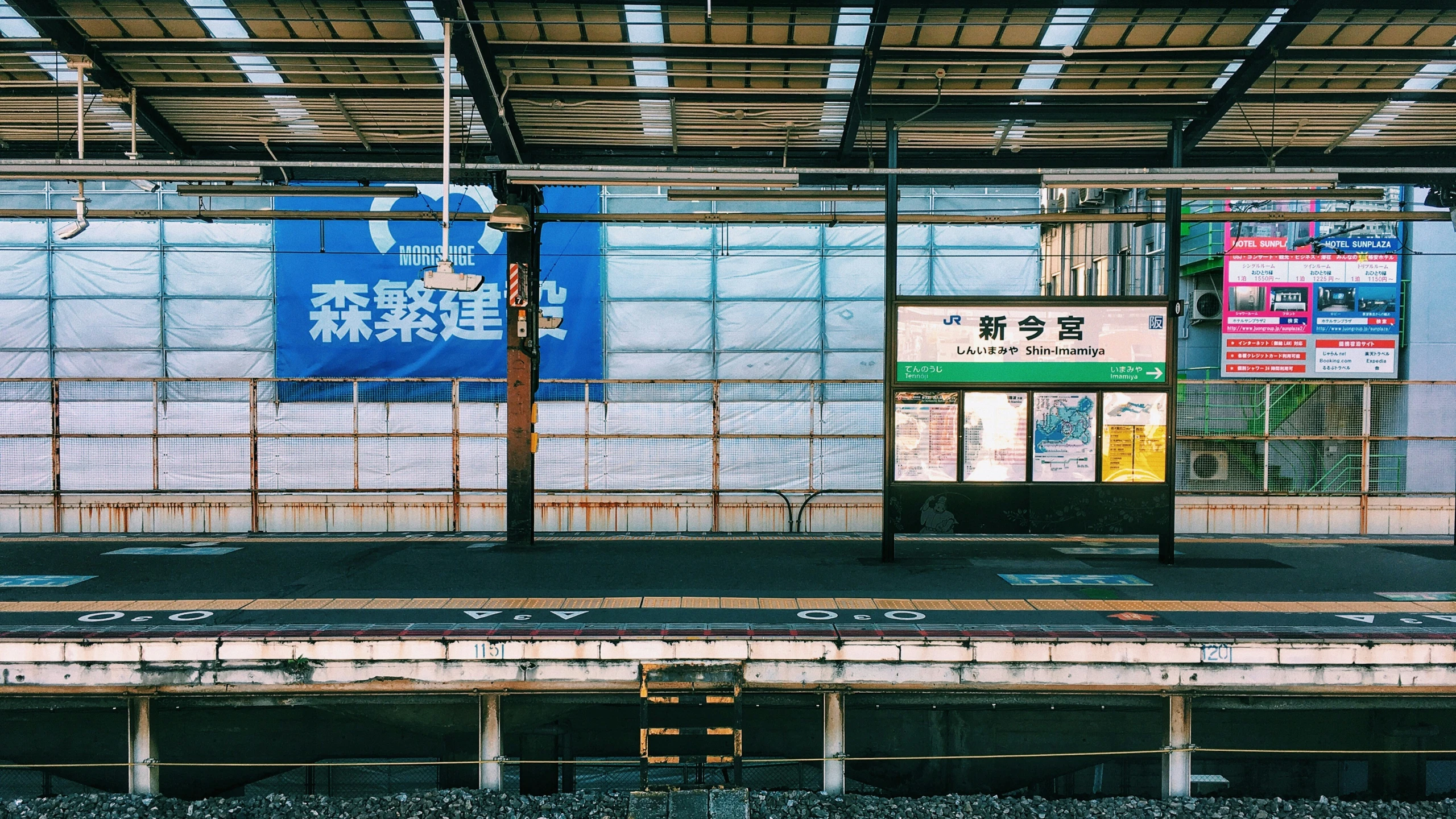 empty train platform with doors and railings at subway station