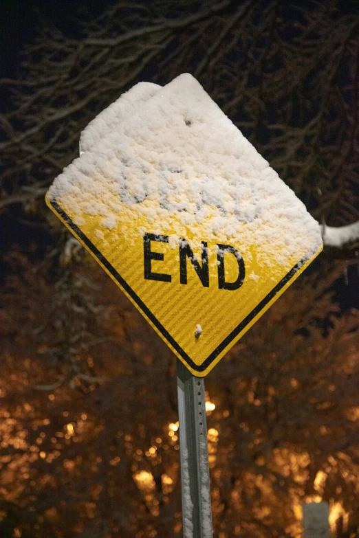 a street sign showing the way to end