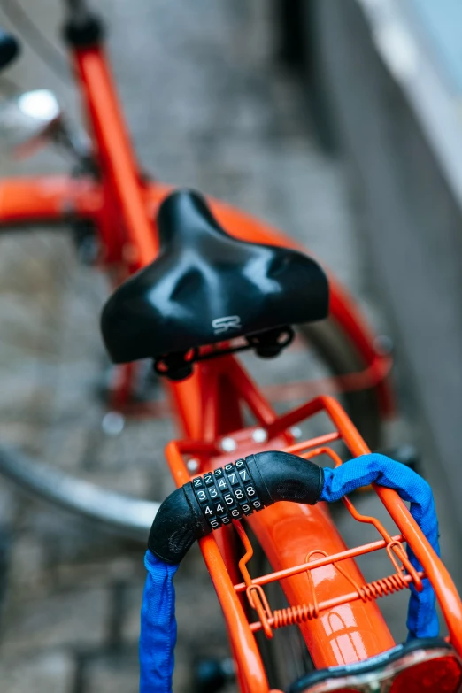 a bike with an orange basket and blue saddle bags