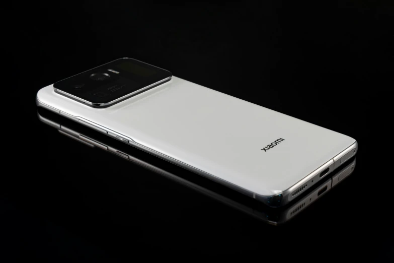 a phone is shown in the dark with reflection