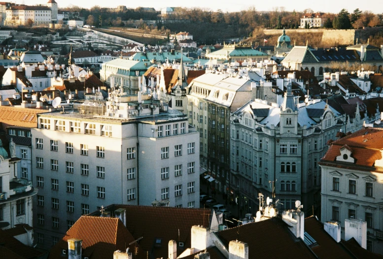 some very tall buildings and a lot of roofs