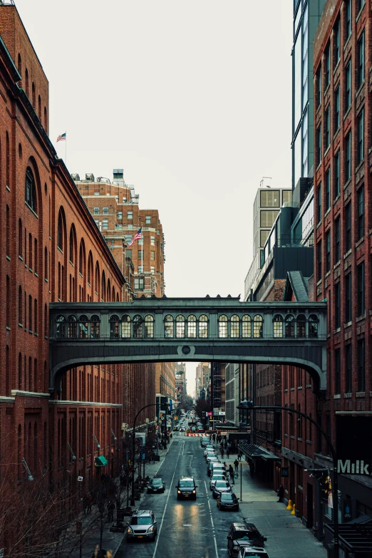 an overpass above an empty city street