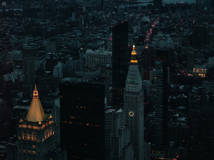 night aerial view of city buildings with tall skyscrs