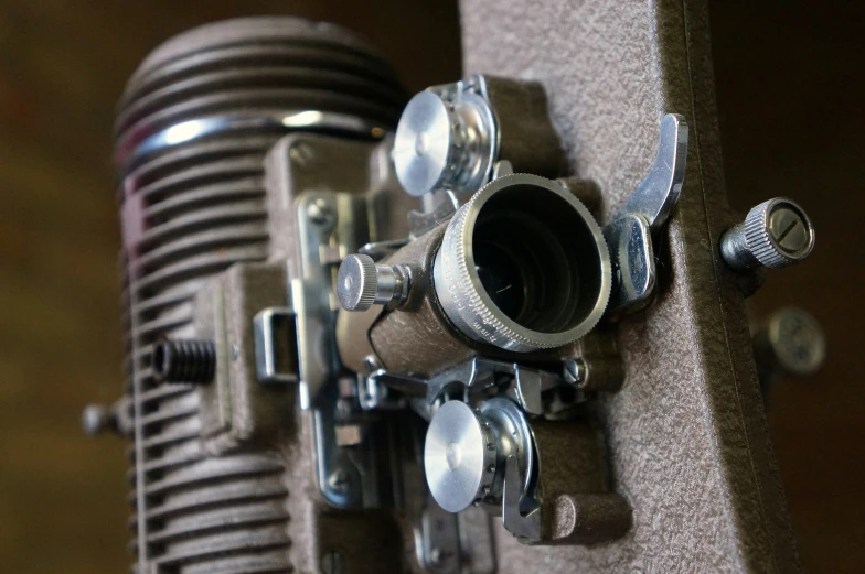 a vintage microphone mounted on the back of a wall