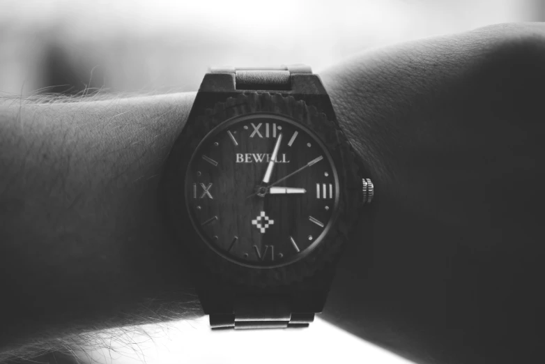 watch displayed on the wrist of a woman
