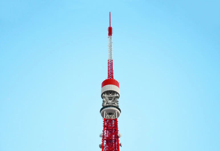 a tower is shown with antennas and lights on it