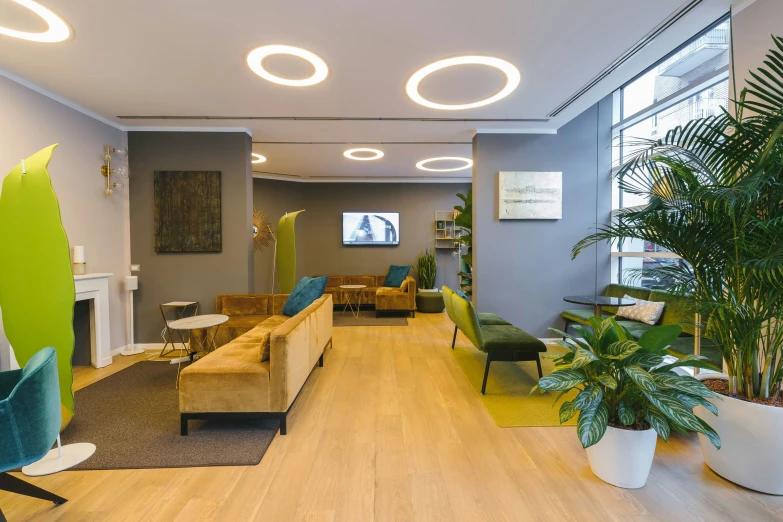 an office lounge is shown in the middle of a wooden floor