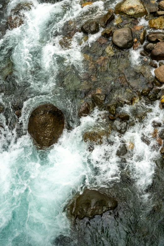 the river has many large rocks in it