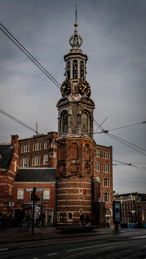 an old church has a clock tower in the center