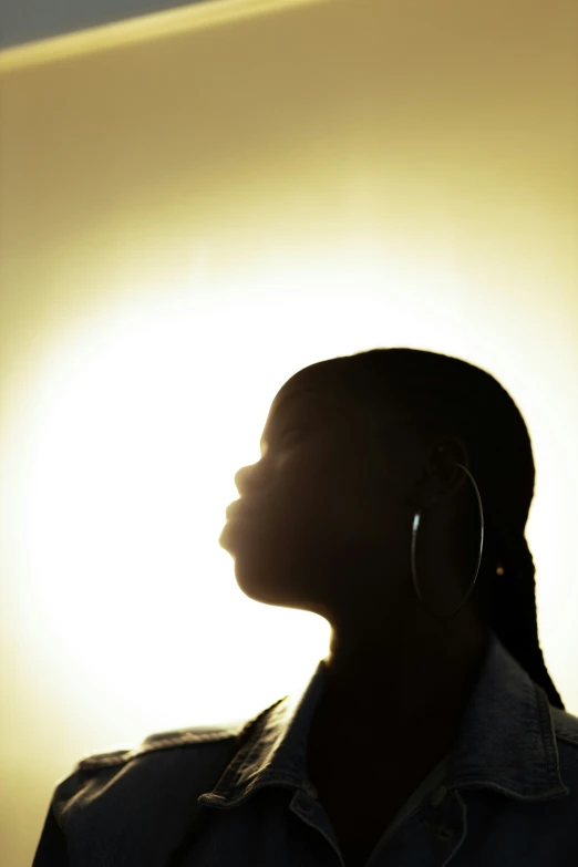 a woman with her back turned to the side