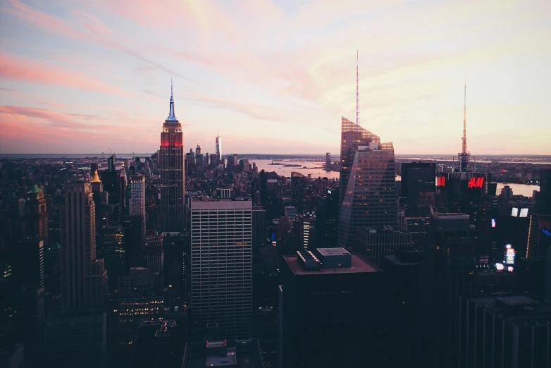 a view of the city skyline at dusk