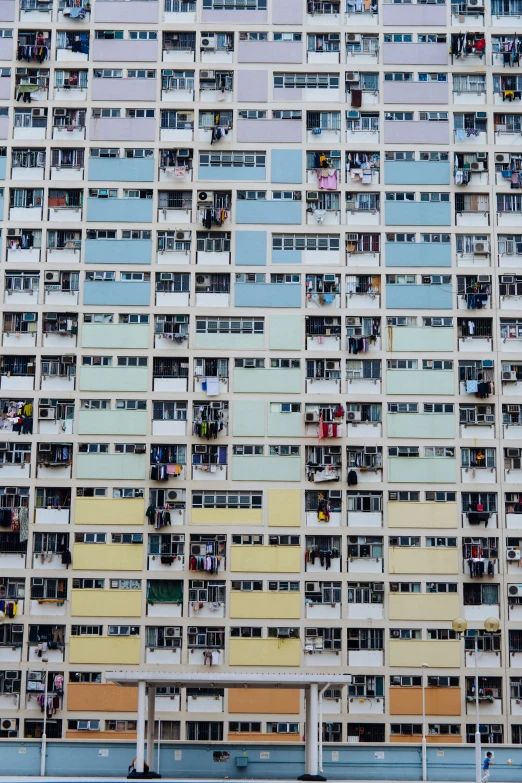 the apartment building is decorated in a mixture of pastel shades