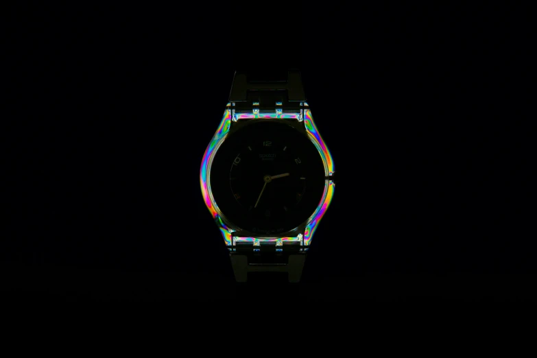 an automatic watch is glowing in the dark