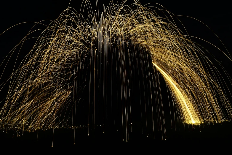 a night view shows several lights moving through the sky