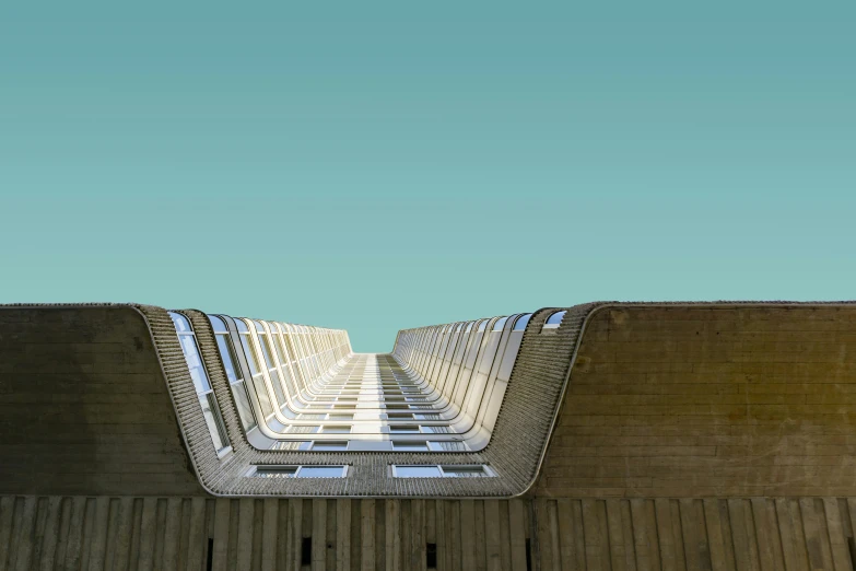 an upward view of a wall and buildings