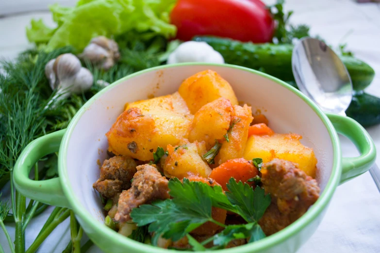 a bowl of soup with some vegetables in it