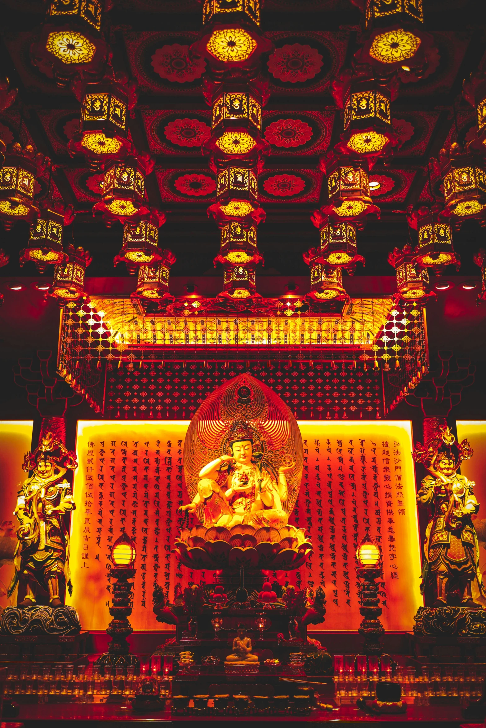 an intricate room with oriental decorations and a statue