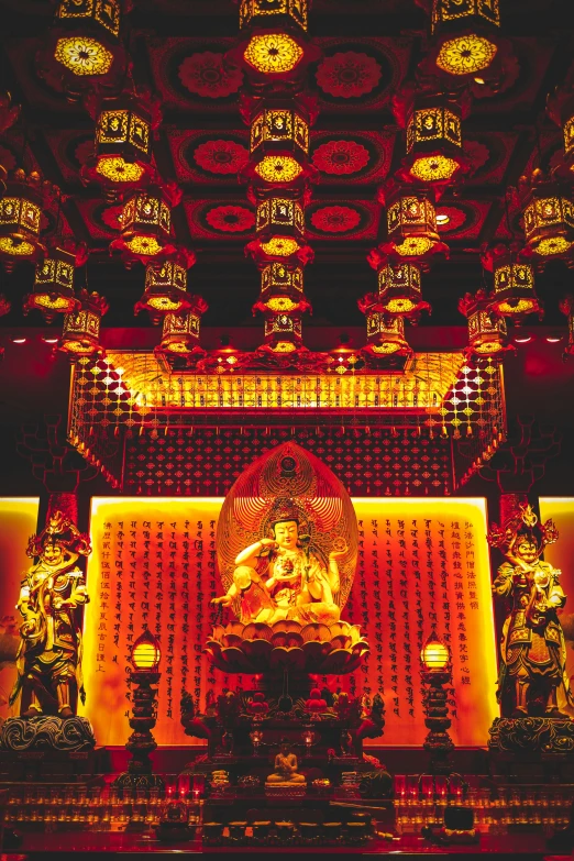 an intricate room with oriental decorations and a statue